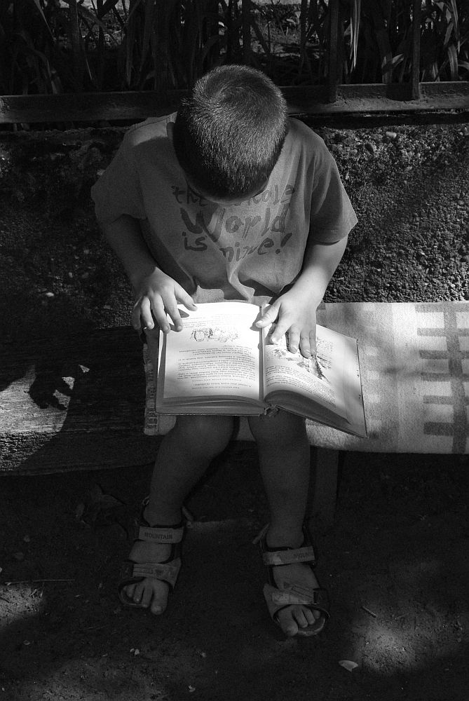 Reading in the shade.