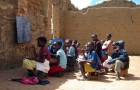 Outdoor school in Kuita, Angola. Photo by Rafaela Printes. Creative Commons licensed.