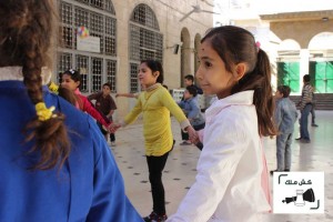 Children during of the Kesh Malek projects in Aleppo, Syria.  Source: Kesh Malek's website.