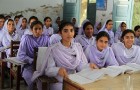The UK government is committed to getting two million more girls into school in Pakistan by 2015. UK aid has already helped more than 590,000 girls in Khyber Pakhtunkhwa stay in school over the last few years by giving them small cash stipends.
Each girl receives 200 rupees (about £1.50) a month, and a set of free textbooks each year to help them get an education.
With an average family size of up to seven or eight and a third of the population living on less than $1 a day, these small stipends and free text books can make the difference between daughters being sent to school or having to drop out.

This photo is attributed to Vicki Francis of the UK Department for International Development and has been licensed under the Creative Commons Attribution-Share Alike 2.0 Generic License.